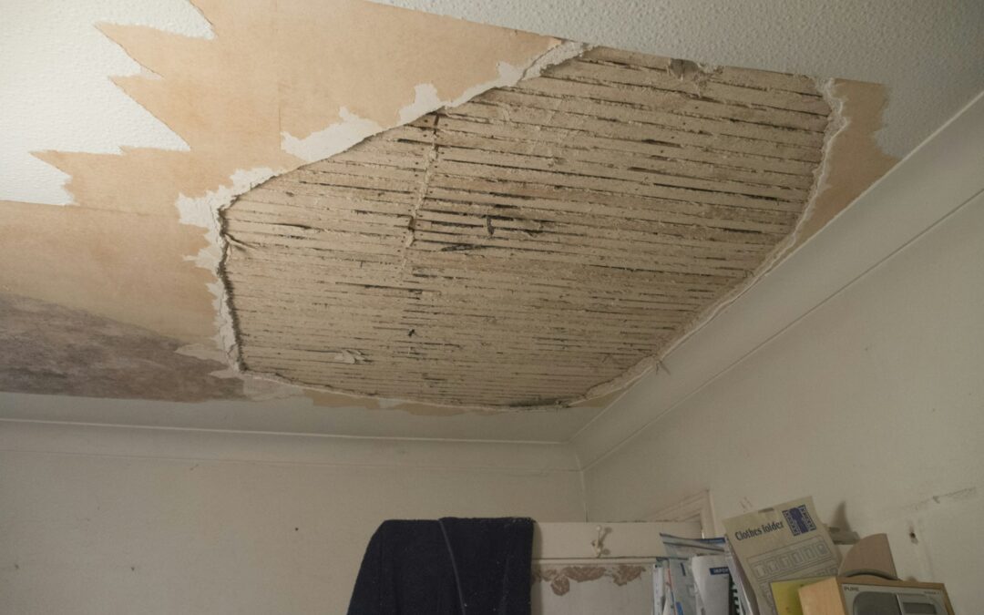 Room with a damaged, torn-open ceiling