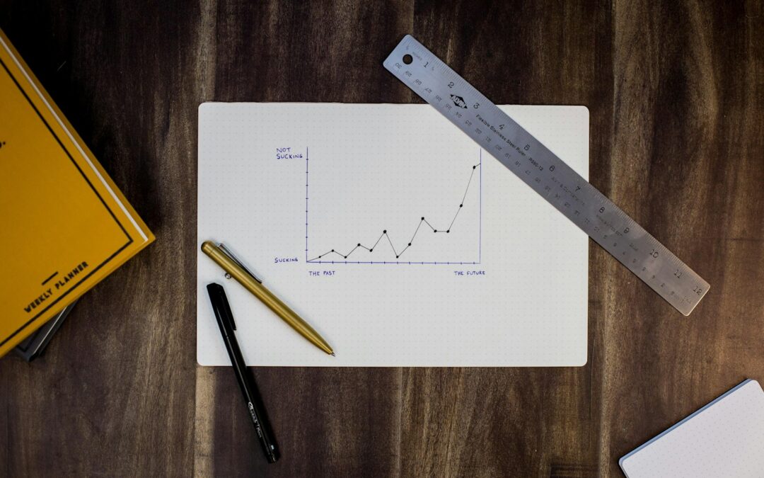 Hand-drawn rising line graph on paper